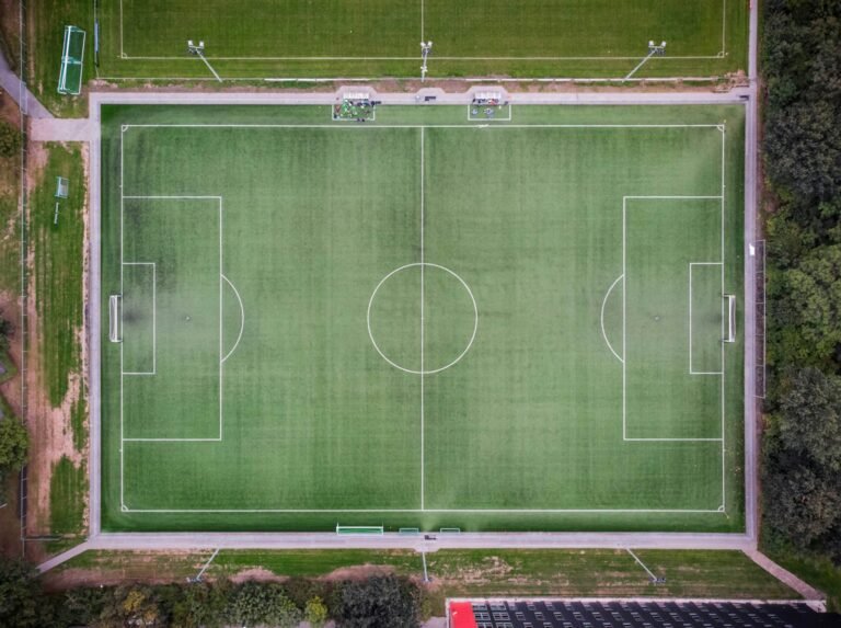 Aerial view of a well-kept grass football pitch