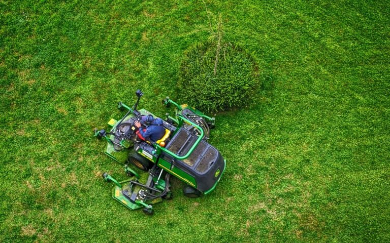 Aerial view of a zero turn mower cutting a large lawn
